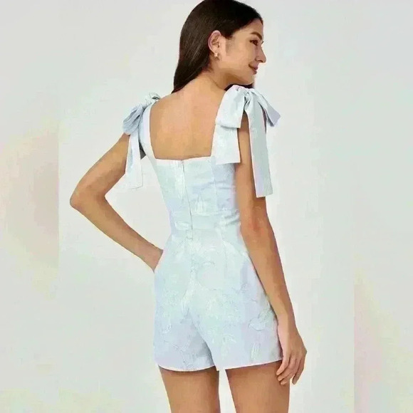 Electra Tie Shoulder Romper in Floral Flutter
by Love, Bonito size XS NWT - Picture 4 of 12